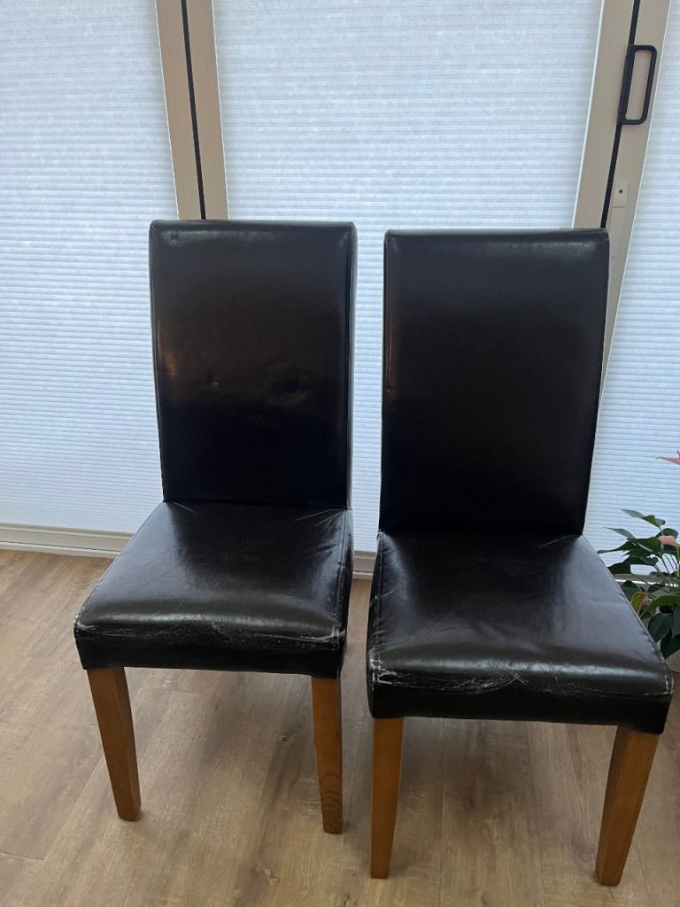 Two Brown Leather Dining Chairs