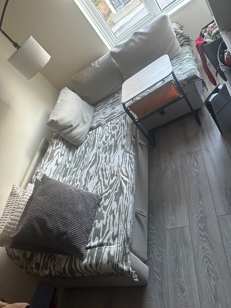 Comfortable Grey Sofa Bed with Storage – Good Condition