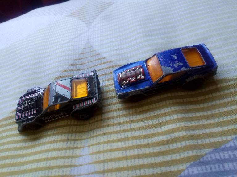 2 vintage very collectable metal toy cars 