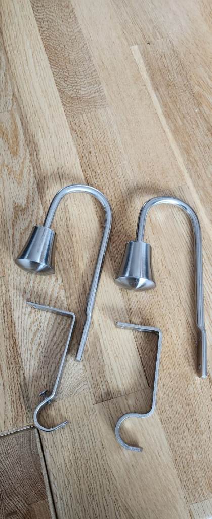 Pair of silver curtain hold backs
