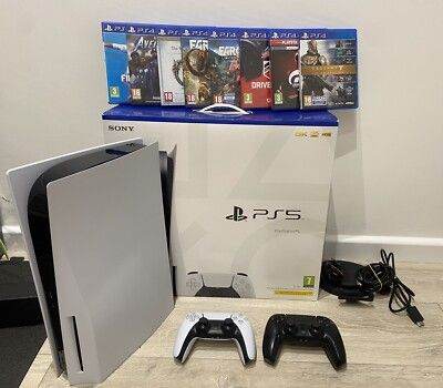 Sony PlayStation 5 Console with 2 Controllers & Games – Good Condition