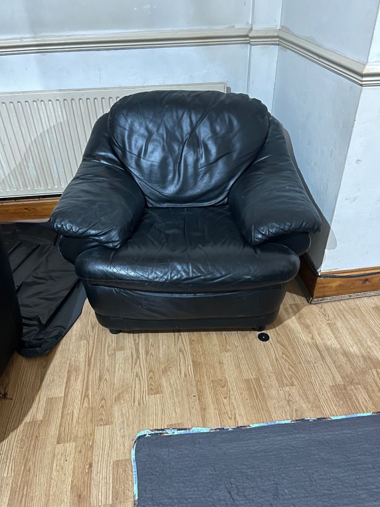 Pair of Black Leather Armchairs - Fair Condition