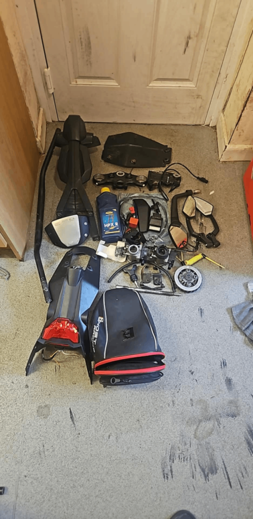 Motorbike parts/clothing/fluids 