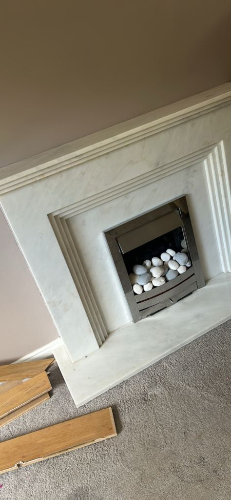 Marble fireplace and electric fire