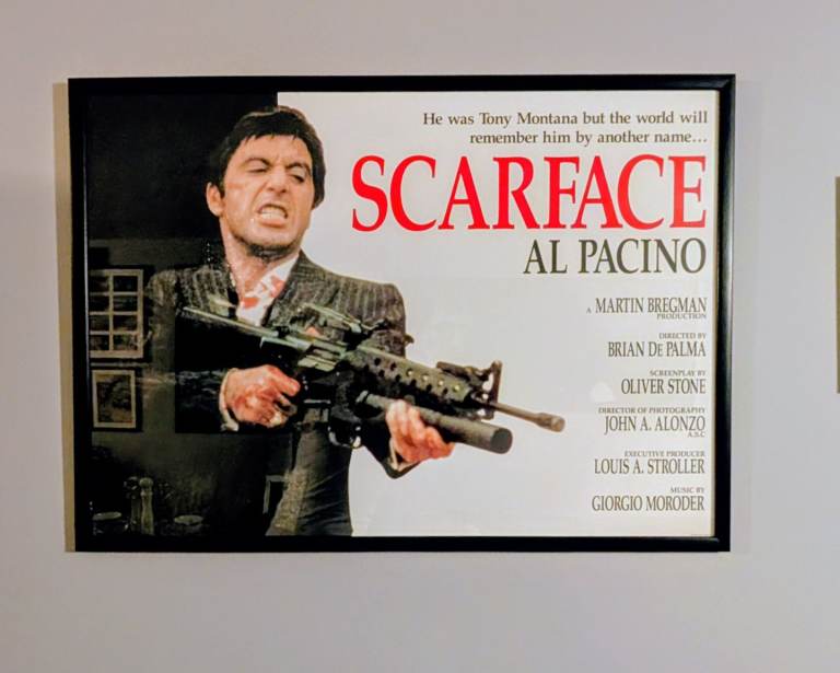 Multiple framed and glass film posters
