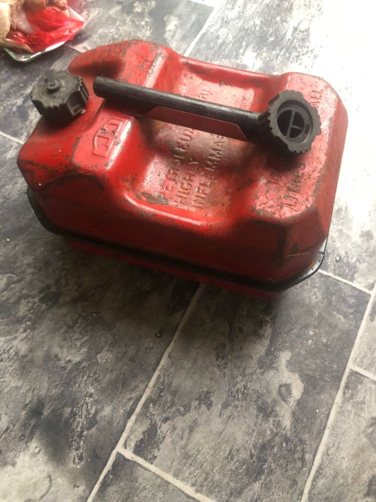 2 gallon 10 litre steel fuel can & spout had diesel in.