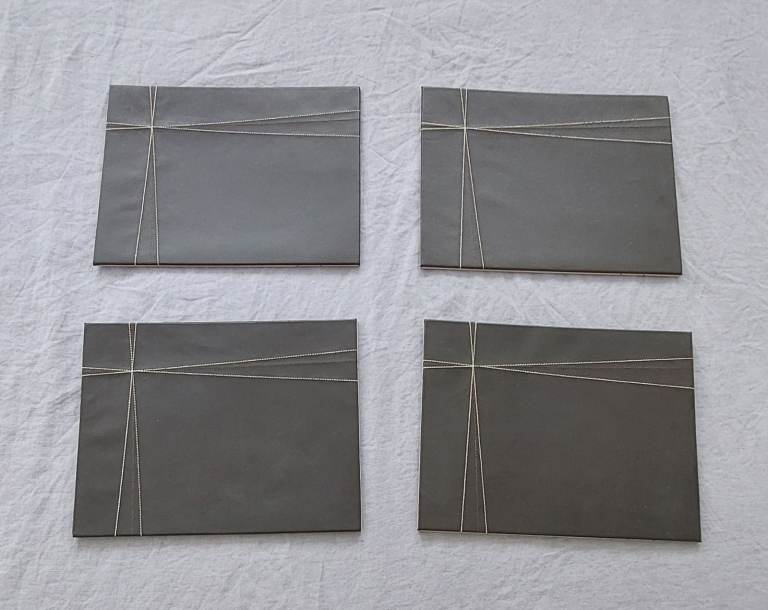 Faux leather placemats x4