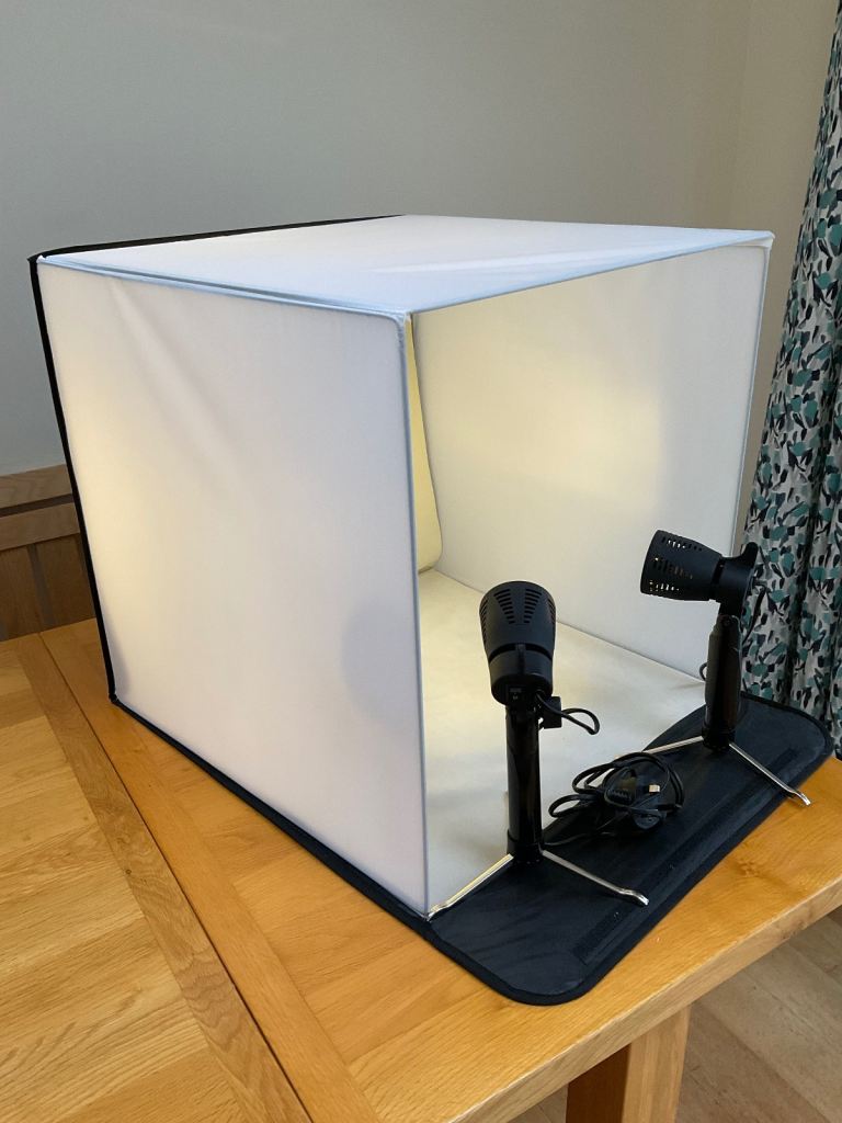 Photographic light box with spot lights and ring fill light