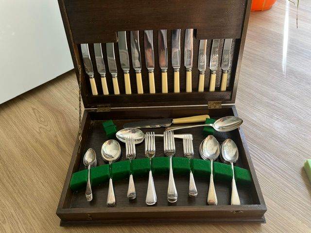 1947 Sheffield Stainless Steel cutlery canteen in original wooden display case. 