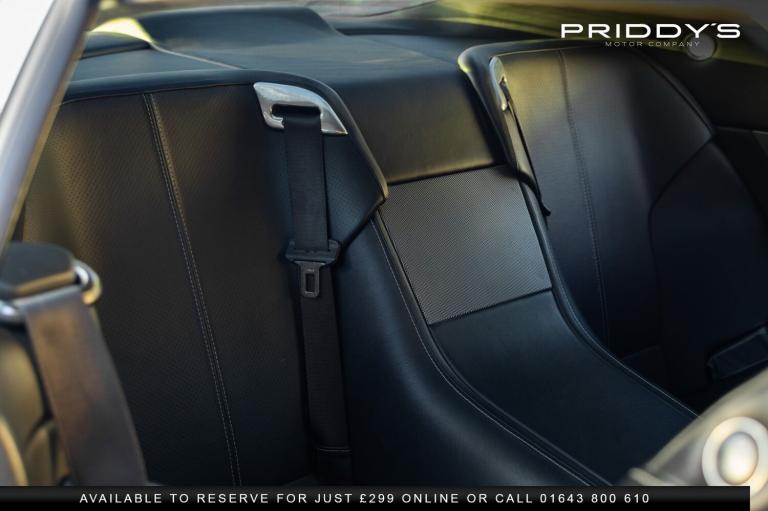 ASTON MARTIN DB9 5.9 - 13 Stamp service portfolio - Future classic by Aston