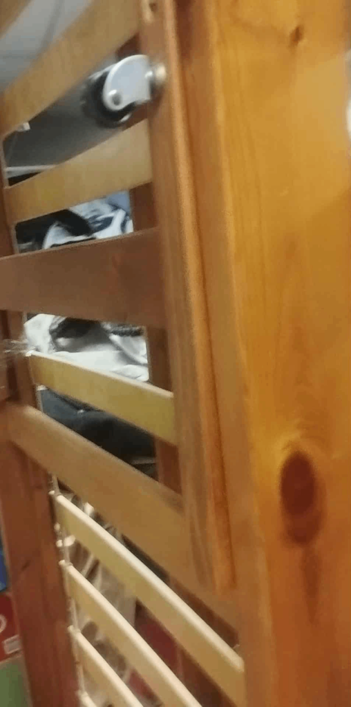 Single pine bed with pull out bed on wheels. Both with mattresses 