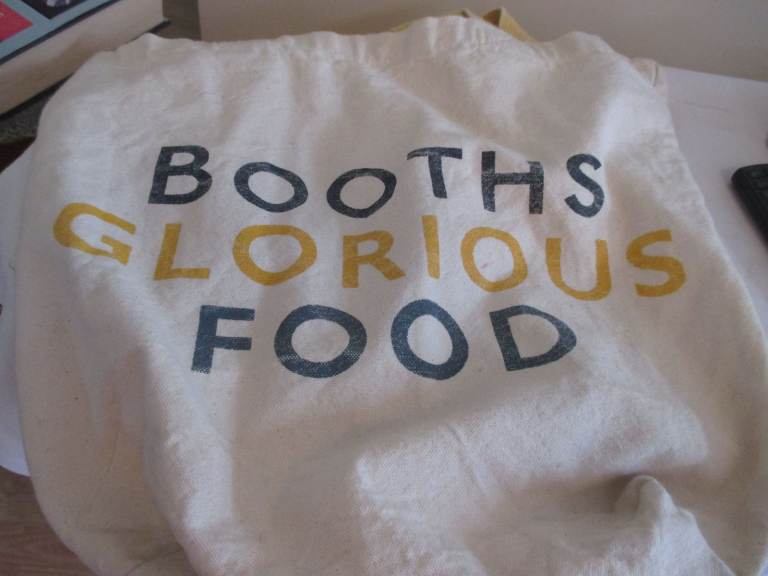 SHOPPING BAG WITH BOOTHS GLORIOUS FOOD PRINTED ON IT 