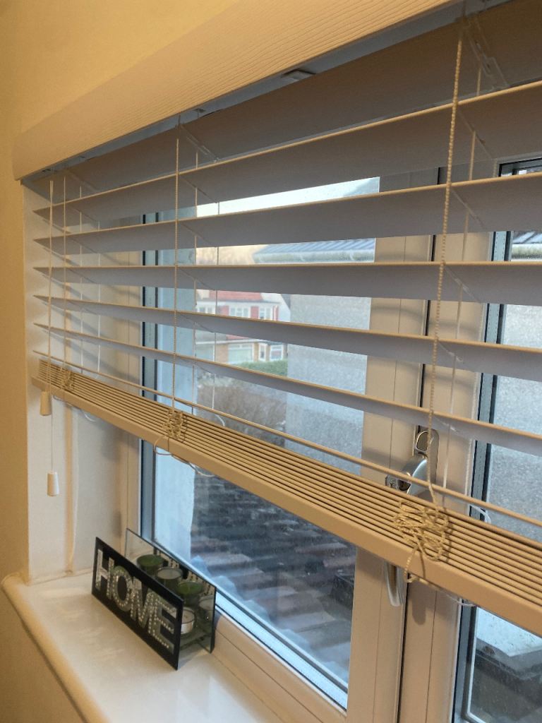 White faux wood blinds