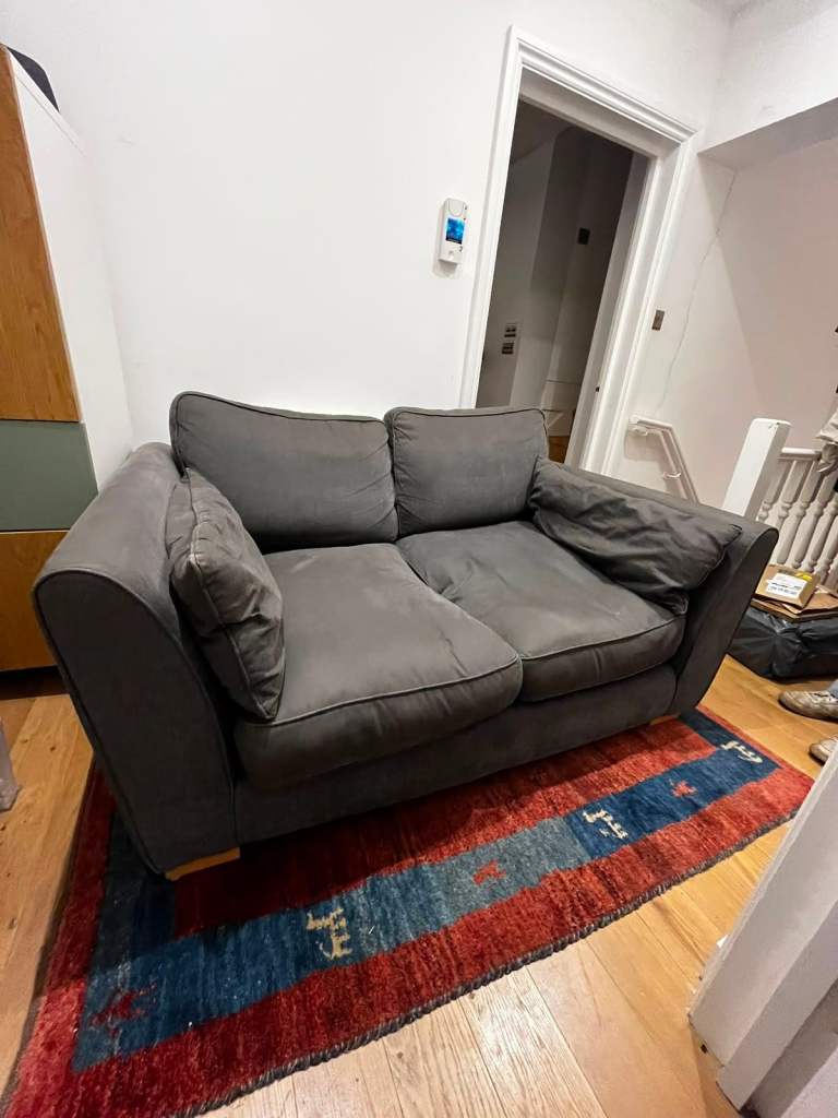 Comfy Grey Two-Seater Sofa – Good Condition