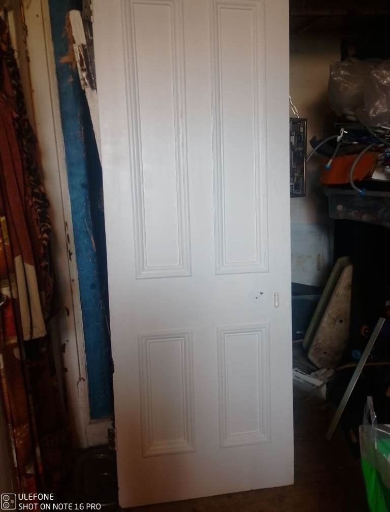 Door four panneled 212 cm x 75 cm