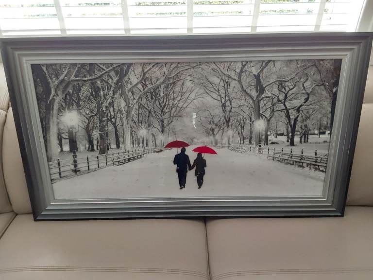 Framed Black and White Winter Scene with Red Umbrellas