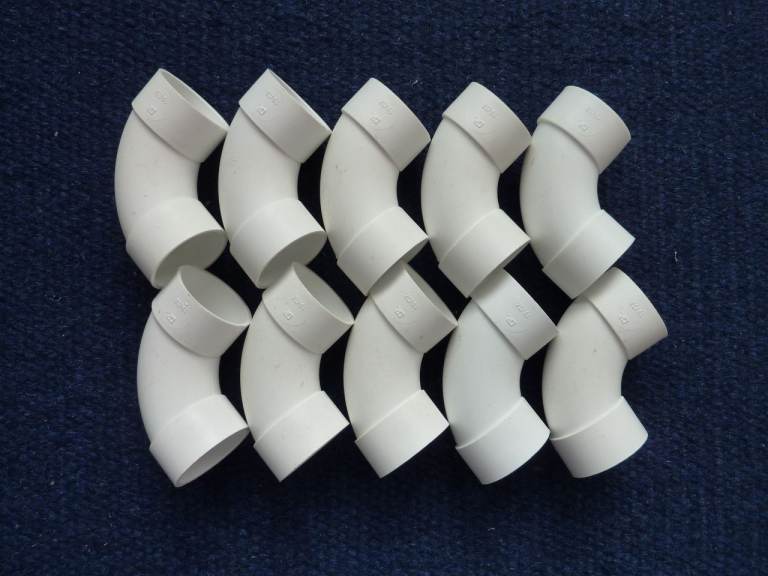 32mm (1¼") waste pipe 92.5⁰ swept elbows, solvent weld. Osma 4Z161W. 40off in total but would split.