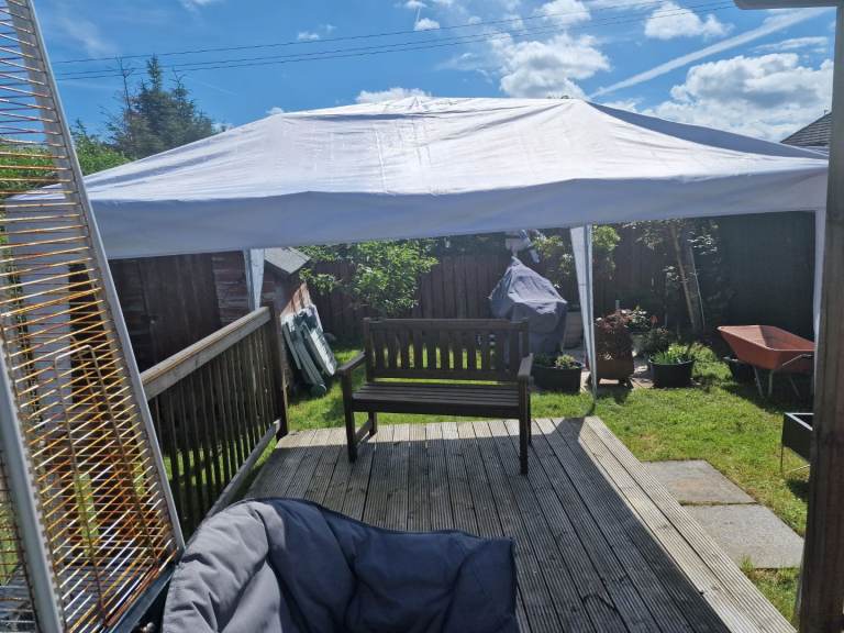 3m by 3m white/silver gazebo with two sides with zip and two sides with window
