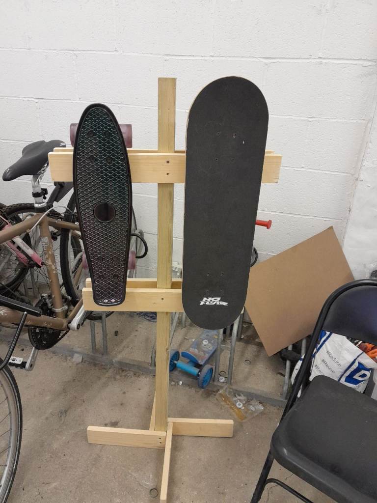 Two Skateboards with Wooden Stand – Good Condition