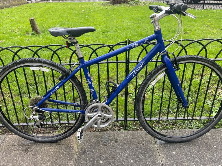 Nice Adult hybrid light Trek bike 700C in very good condition  Fully functional 