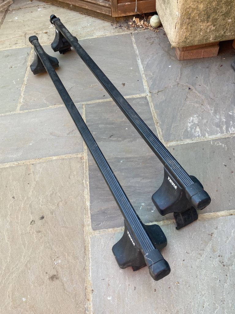 Thule 761 roof bars & Thule 750 foot pack
