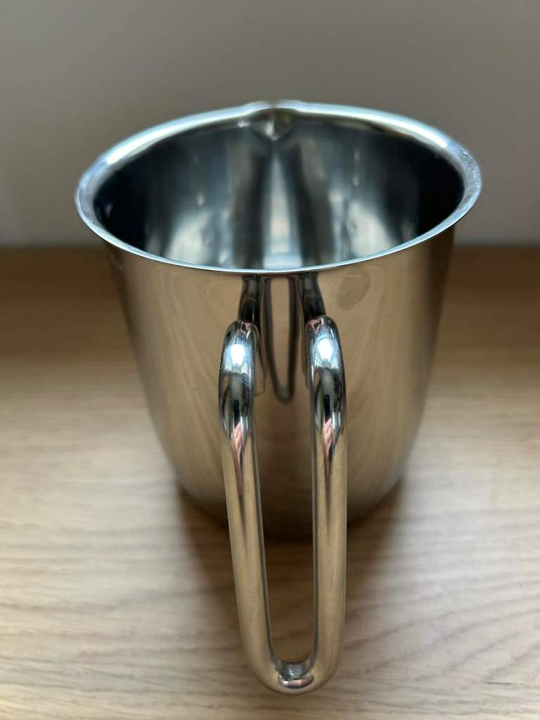 Top grade stainless Steel measuring jug with rod handle.