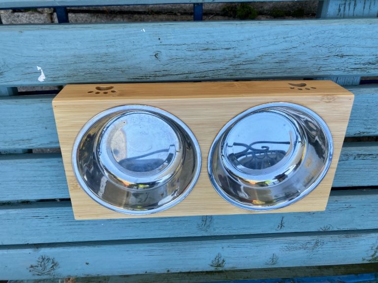 Wooden pet food and water bowls with stainless steel inserts