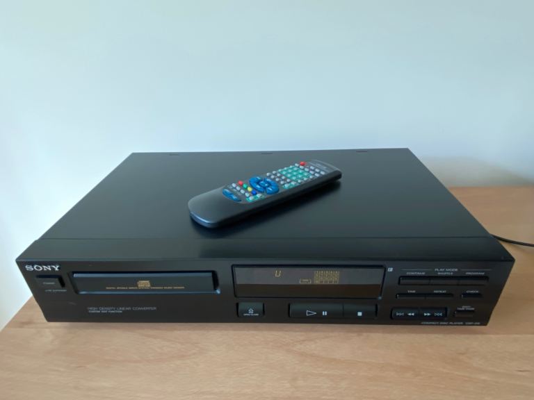 Sony CDP-312 CD Player with universal Remote Control.  Good Condition