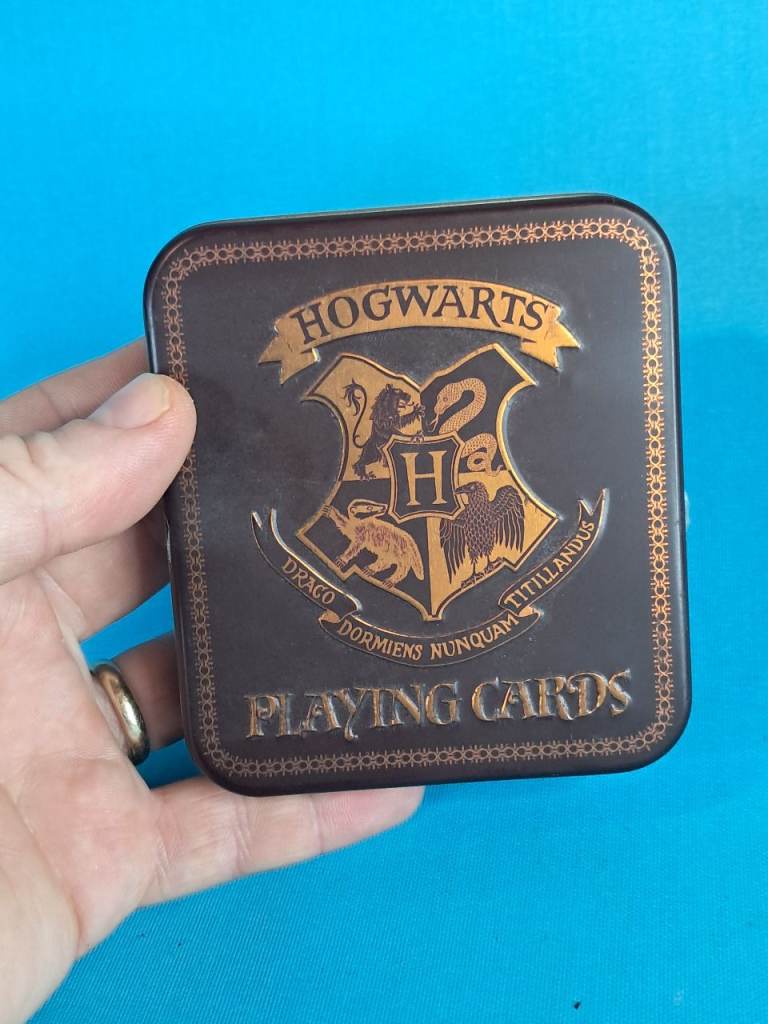 Brand new Harry Potter Hogwarts Playing Cards in an embossed collector's tin