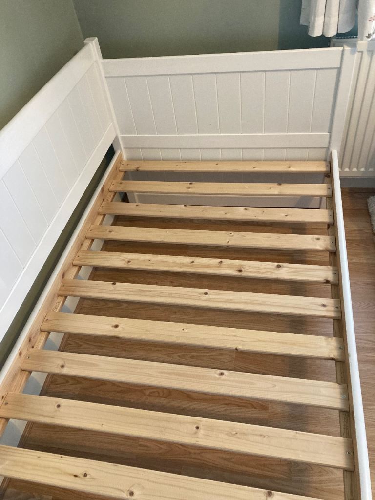 Single wooden day bed with drawers 