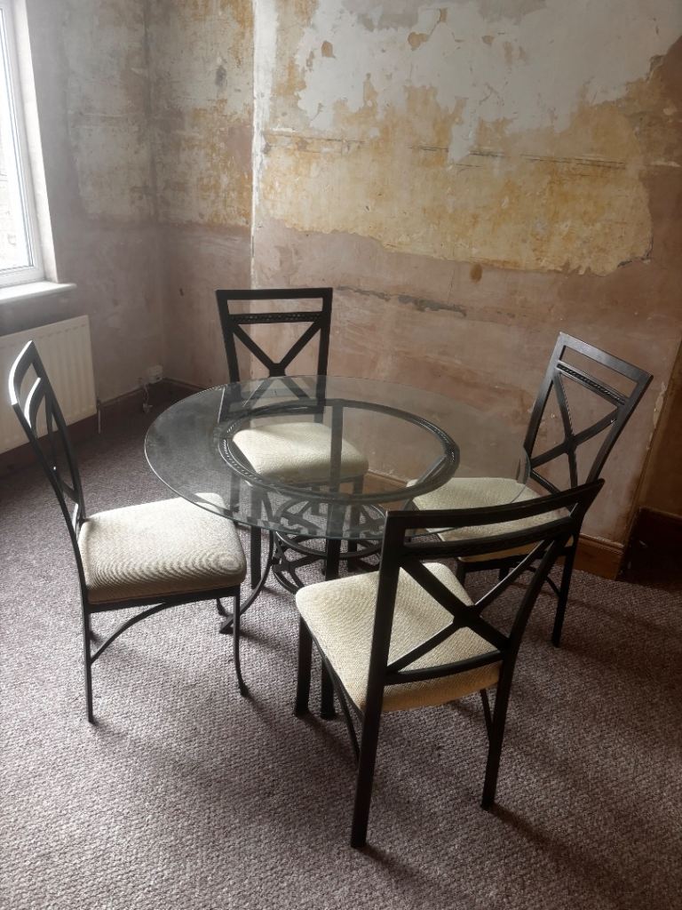 Glass top table and chairs