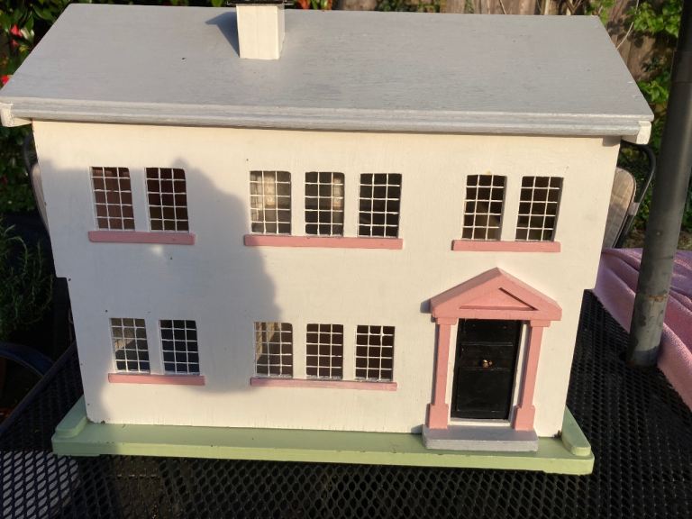 Wooden dolls house and furniture