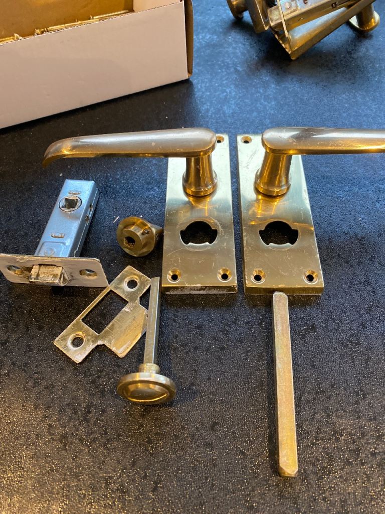 Brass locking bathroom door handles