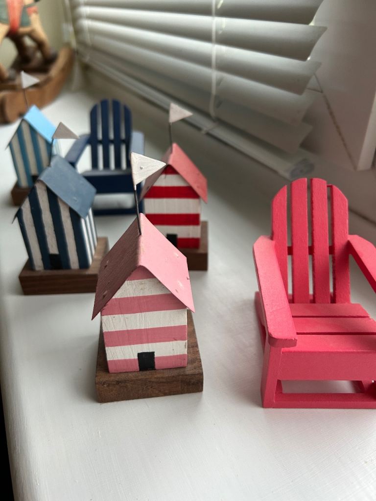 Wooden Beach  huts/deck chairs 