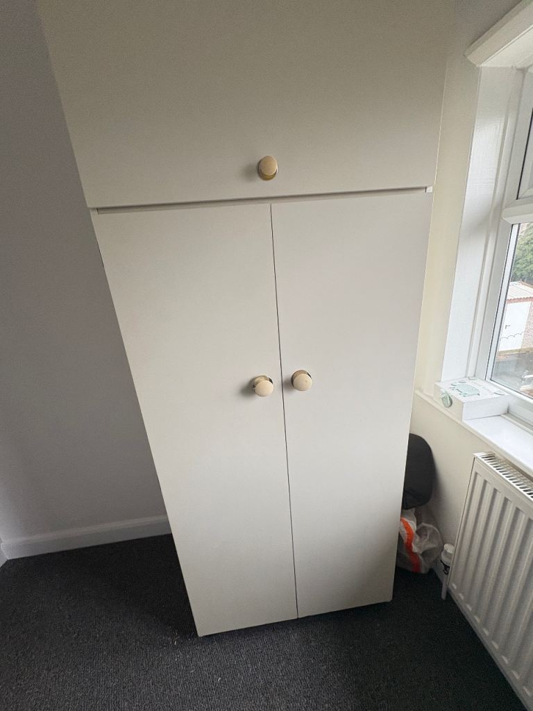 Double door wardrobe with top 