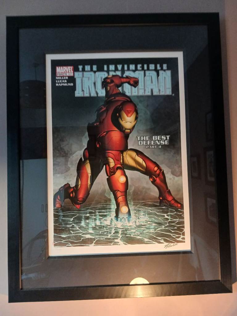 The Invincible Ironman. The Best Defence. Signed by Stan Lee and  framed print.