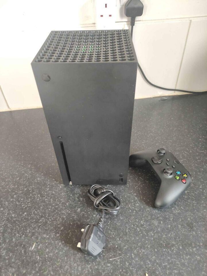 Xbox series X console with pad and cables