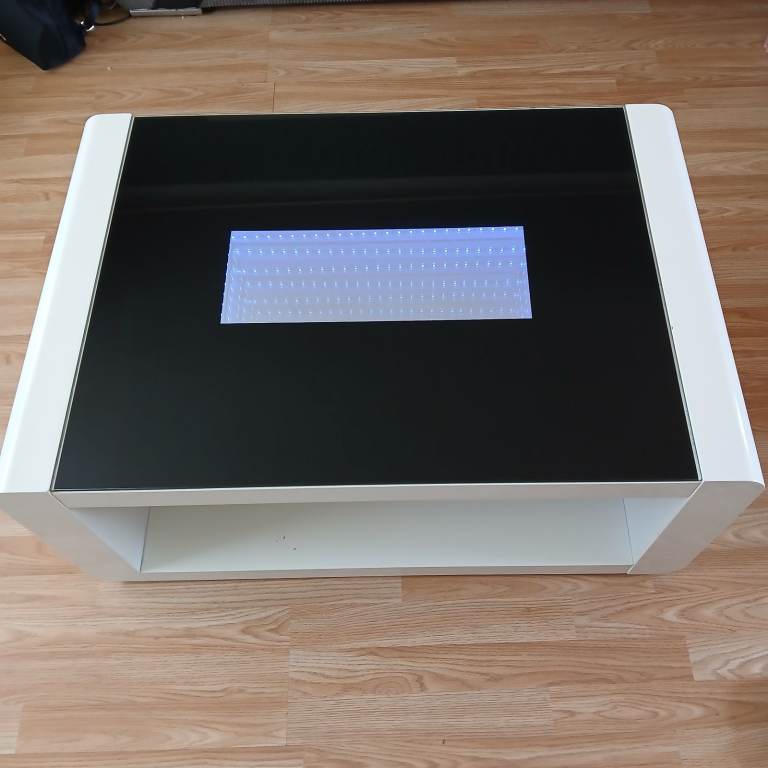 Modern White Coffee Table with Black Glass Top – Good Condition