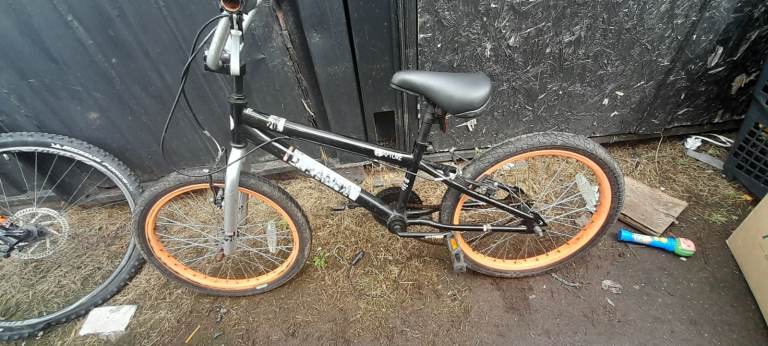 Black BMX Bike with Bright Orange Wheels – Fair Condition