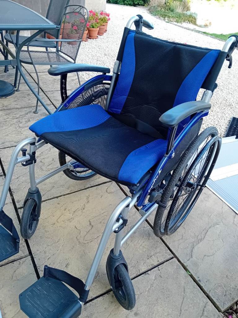 ErgoPro Wheelchair - Blue and Black, Good Condition