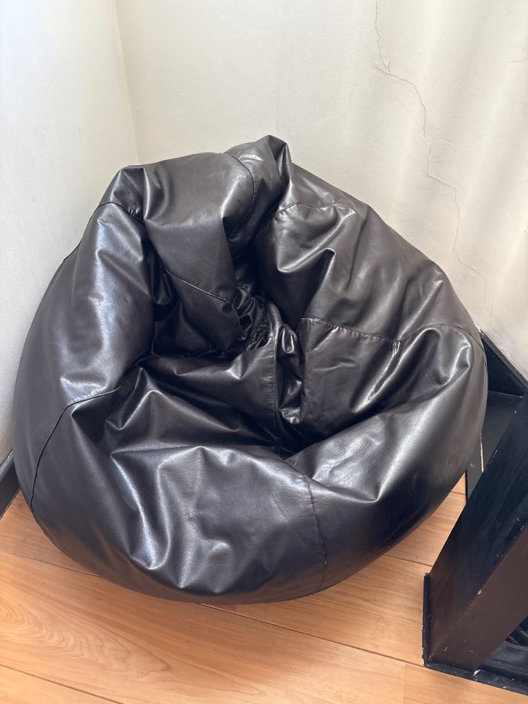 Large dark brown faux leather beanbag
