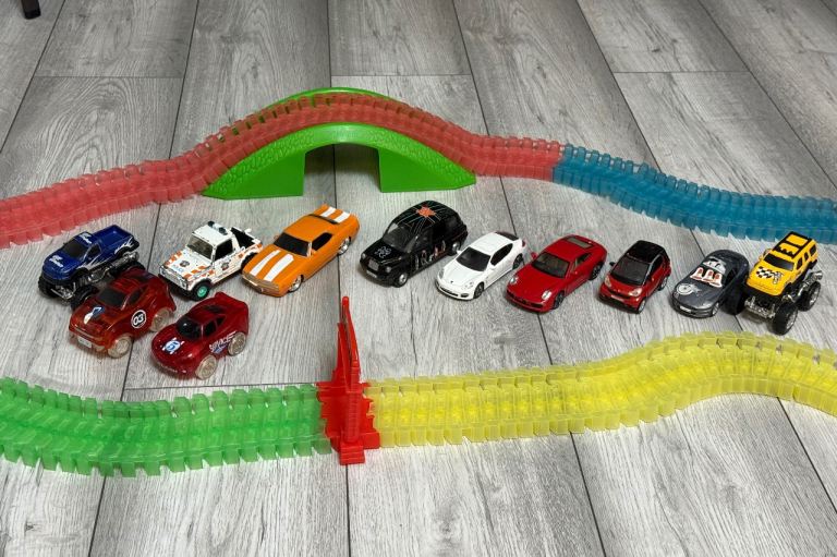 Racetrack with toy cars included 