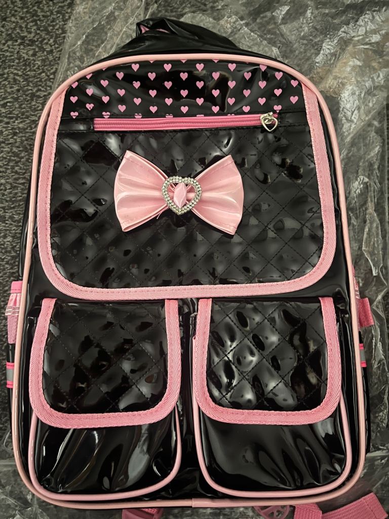 Brand new girls pretty black and pink bow hearts backpack