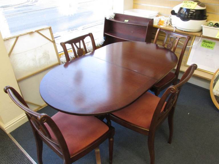 image for TRADITIONAL MAHOGANY EXTENDING TABLE AND 4 CHAIRS at HAVEN TRUST CHARITY SHOP