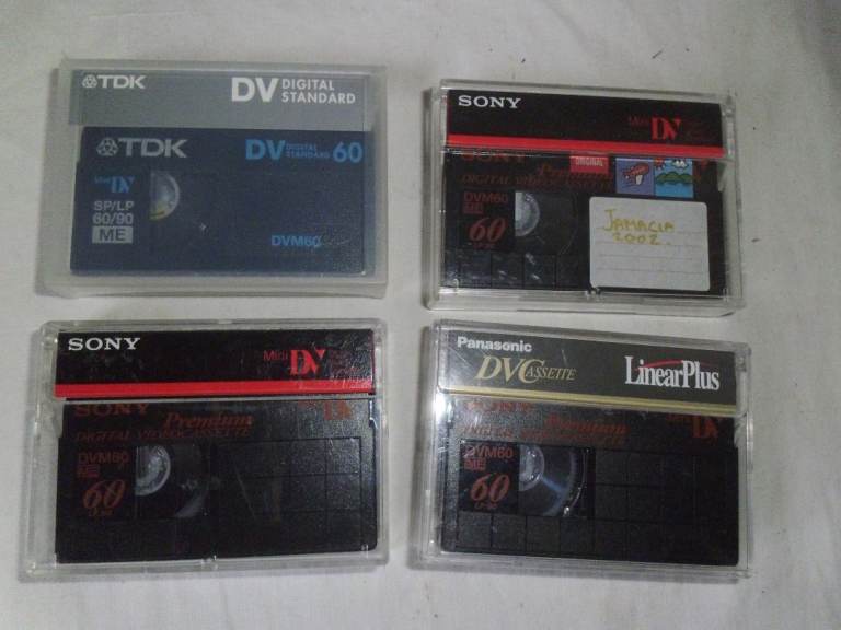 4 X DIGITAL VIDEO CASSETTES.