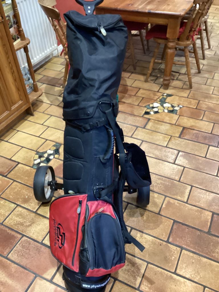 Full set of left handed golf clubs with bag, trolley, umbrella &balls