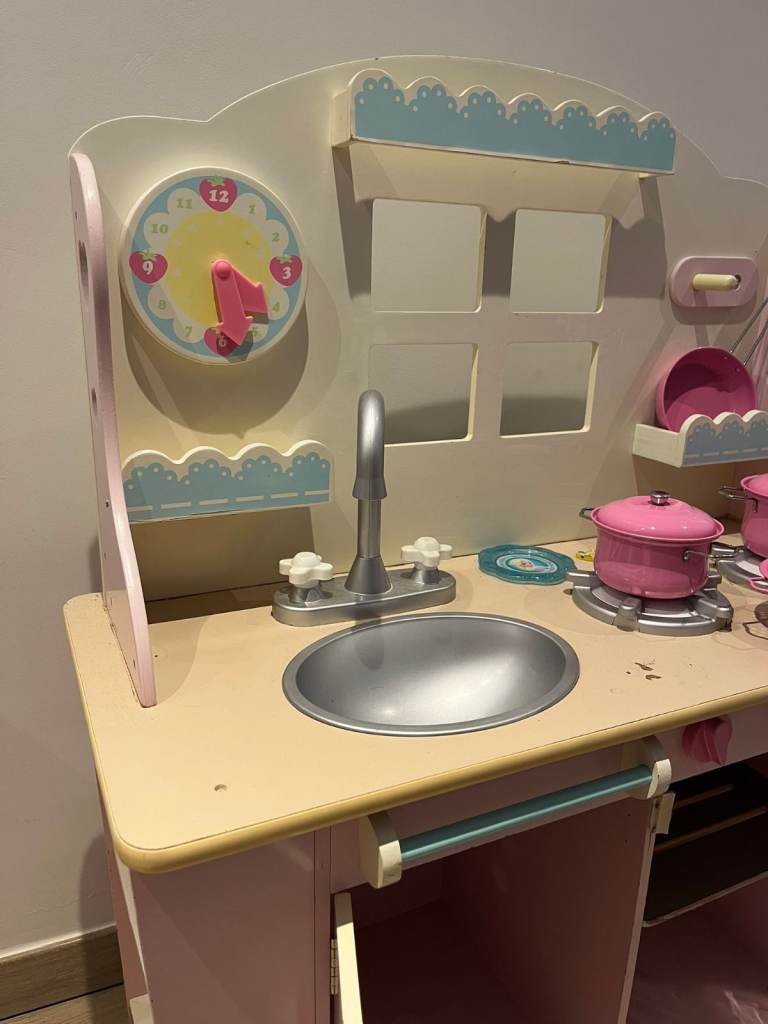 image for Wooden play kitchen with accessories.