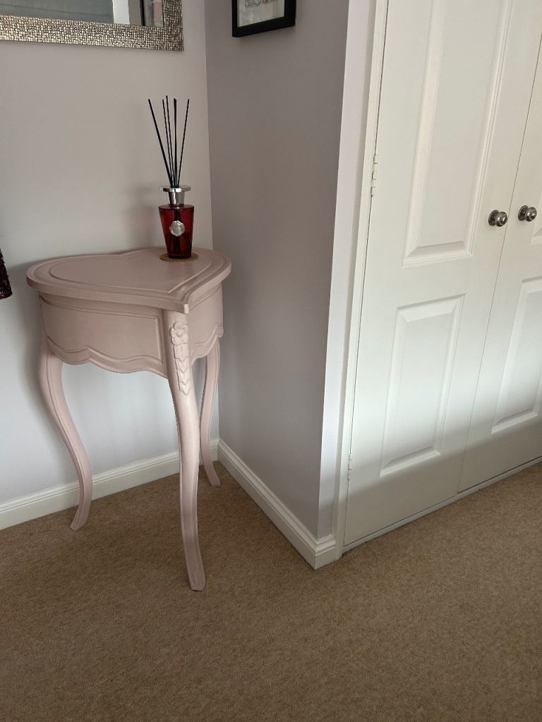 Pale pink corner console table 