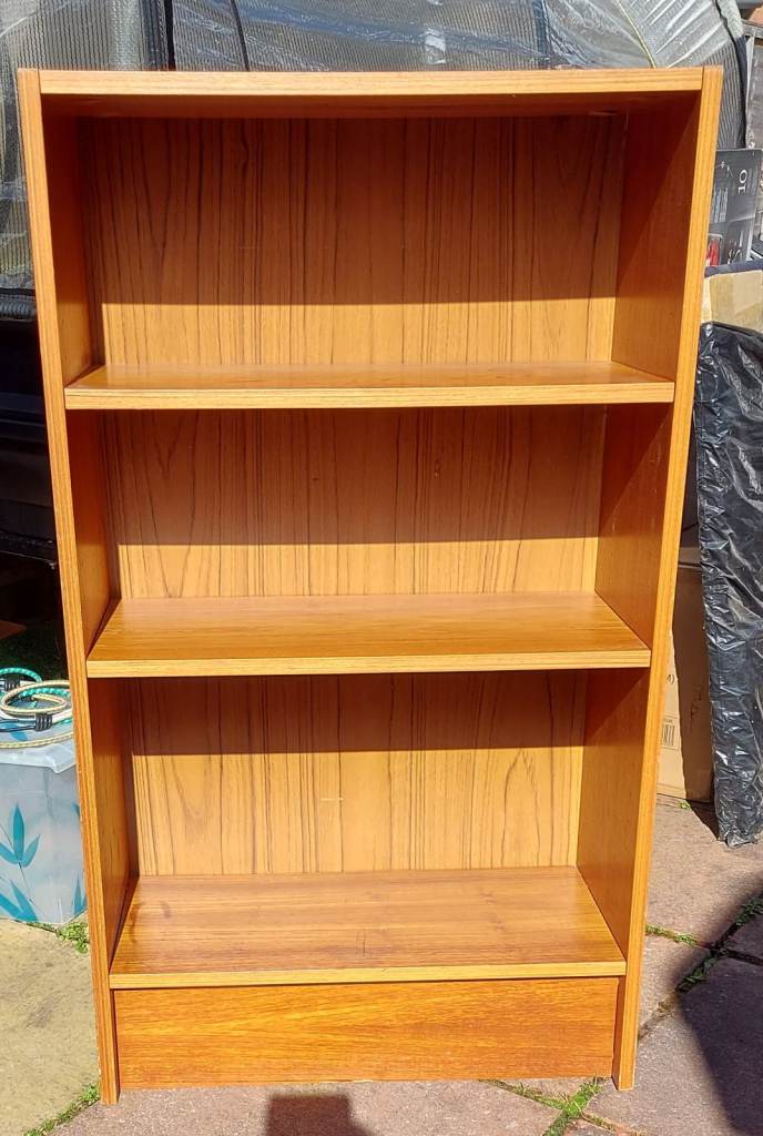 Solid shelving unit, adjustable shelves, few stains. 