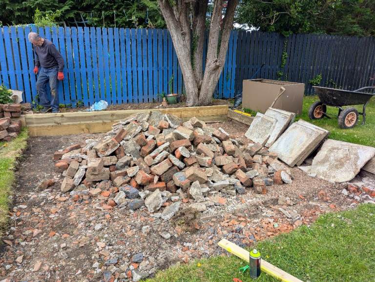 Large pile of bricks cement and rubble suitable for infill
